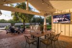 Covered patio with large outdoor TV